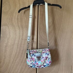 Coach crossbody with a snap front pocket